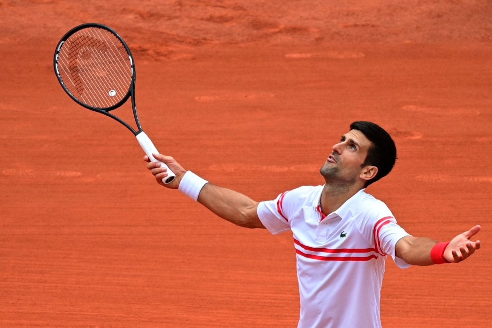 Djokovic 'not anti-vax' but prepared to miss out on Grand Slam history