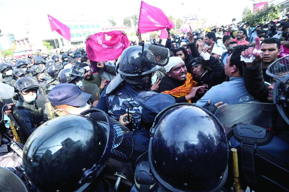 Nepal police fire tear gas, MPs debate US grant