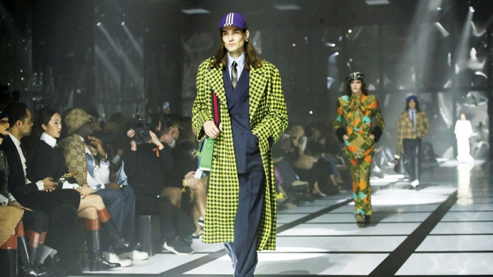 Gucci mixes fashion with sportswear at Milan Fashion Week return