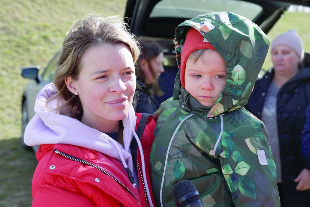 Ukrainian reaches safety in time for his 2nd birthday