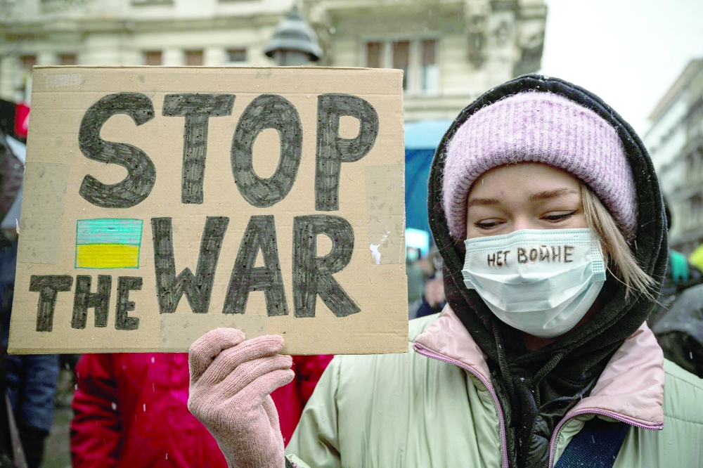 Putin tells Ukraine to stop fighting