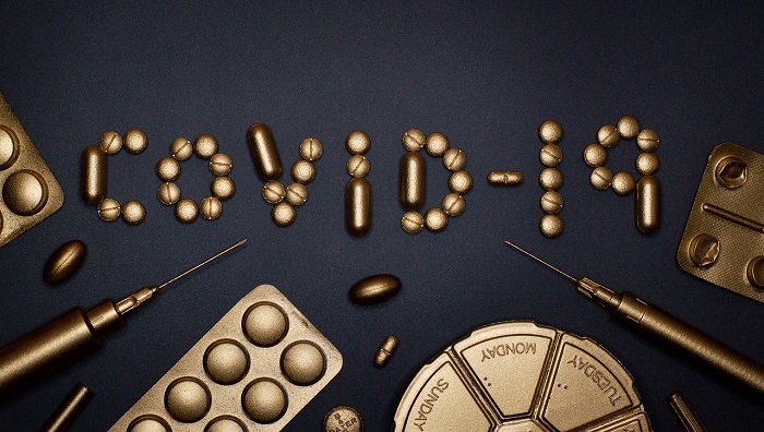 WHO says global COVID-19 cases, deaths declined again last week