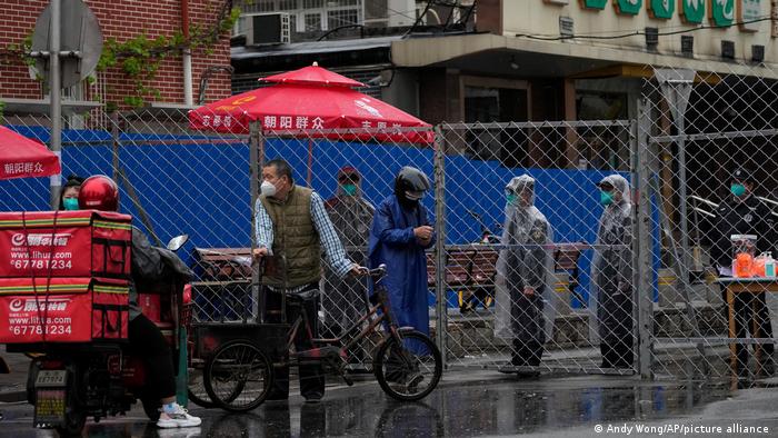 Beijing locks down venues as Shanghai relaxes rules for more people