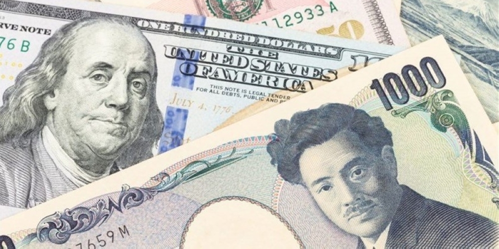تراجع الين أمام الدولار إلى أقل مستوياته منذ 20 عاماً