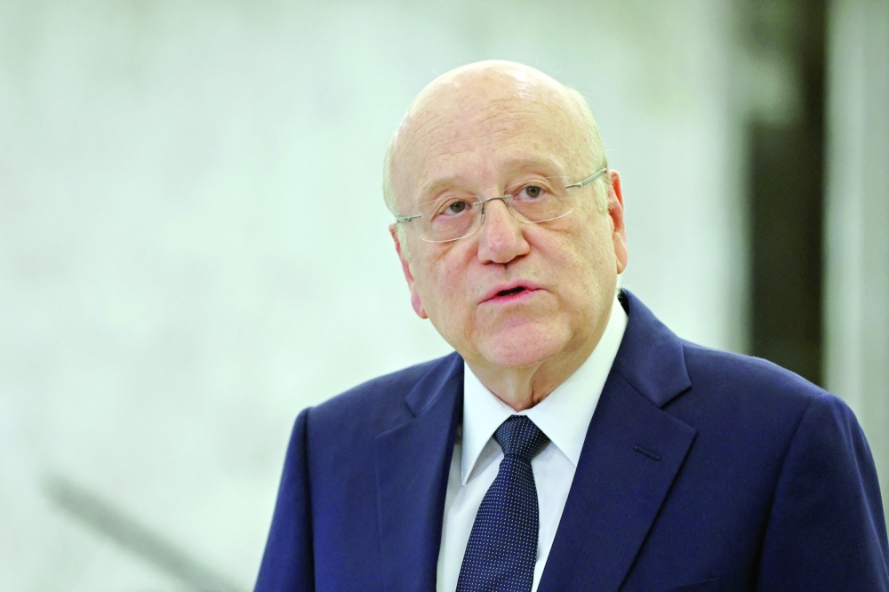 حاز 54 صوتاً من أصل 128 نائباً في البرلمان
عون يكلف ميقاتي بتشكيل الحكومة اللبنانية الجديدة