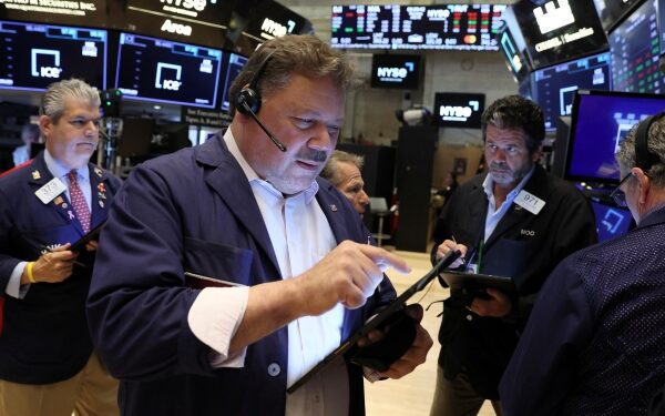 Stocks mixed as traders eye weak data, euro drops