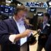 Stocks mixed as traders eye weak data, euro drops