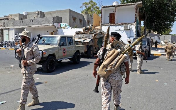 Fighting rips through Libyan capital, killing 13