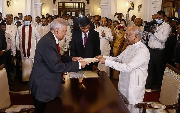 Sri Lankan security forces raid protest camp as new leaders sworn in