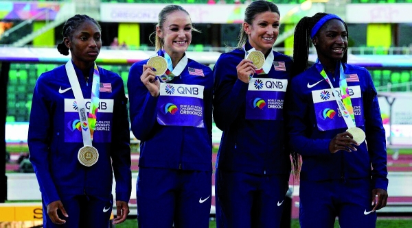 US women stun Jamaica in relays, men falter again