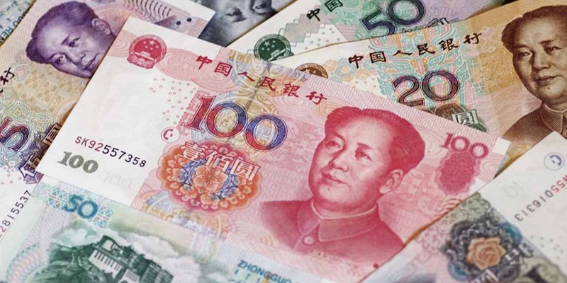 الصين تحدد سعر الدولار أمام اليوان عند 6.7437
