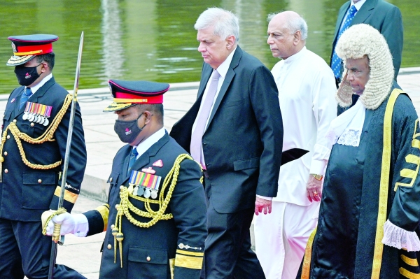 Sri Lanka to restart IMF bailout talks, president calls for unity govt