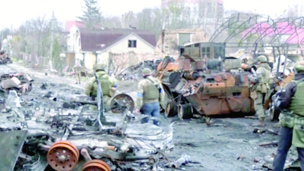 بوتشا المدينة الأوكرانية المنكوبة تدفن قتلى مجهولي الهوية