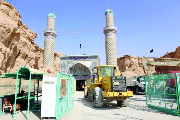 Two more bodies pulled from Iraq shrine landslide