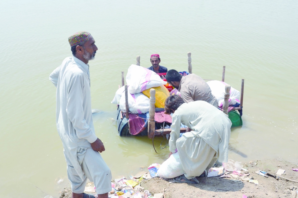السلطات الباكستانية تسابق الزمن لمنع فيضان أكبر بحيرة في البلاد