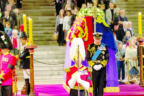 King Charles, William greet well-wishers in queen's queue