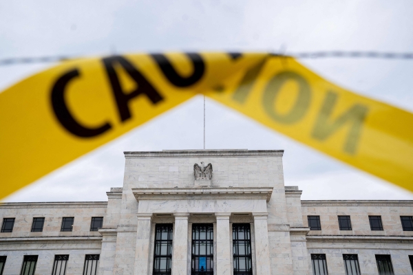 Markets tumble again as Fed hikes rates
