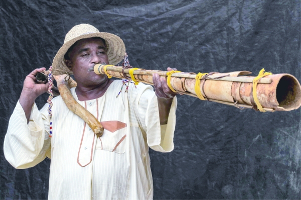 Sudan traditional wind instrument trumpets harvest time