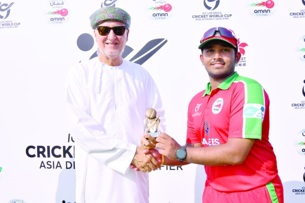 Dhiman shines in Oman’s win