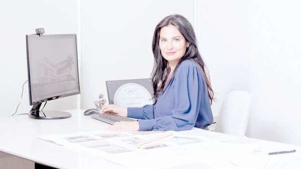 A woman experienced in designing airport facilities