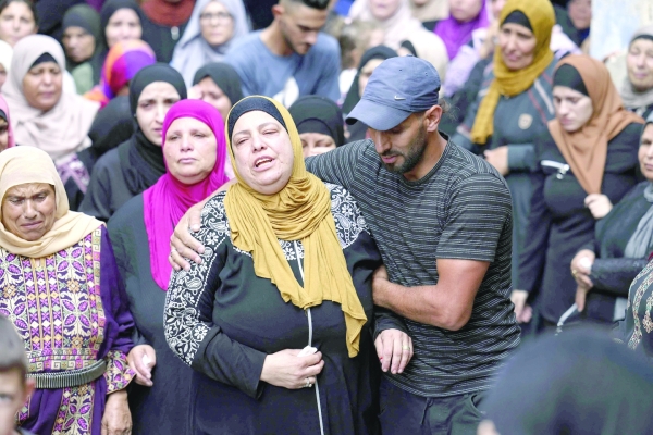 Two Palestinian teens shot dead in West Bank raid