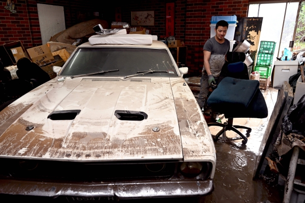 Rising waters again force evacuations in Australia