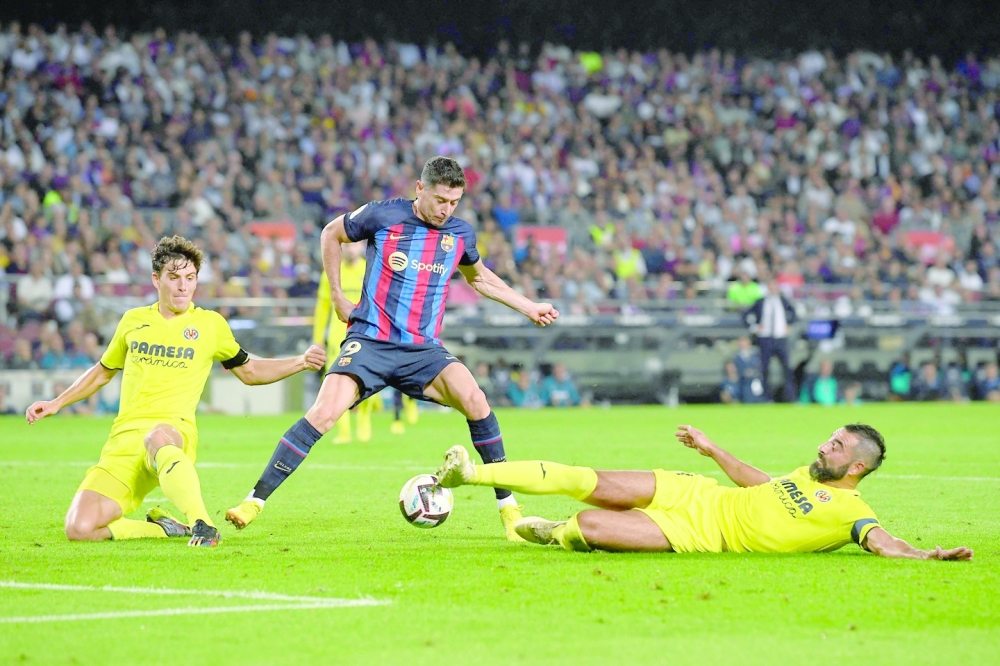 ليفاندوفسكي يقود برشلونة لنفض غبار الكلاسيكو !