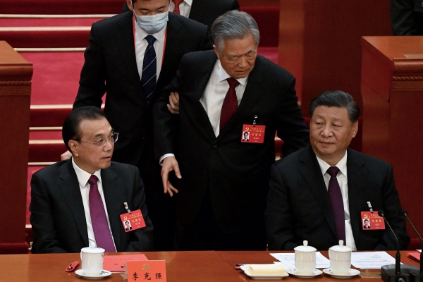 How is China's Communist Party changing its constitution?