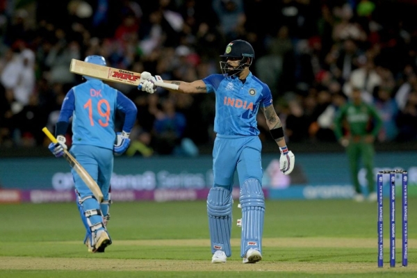 Kohli tops charts as India on brink of semis