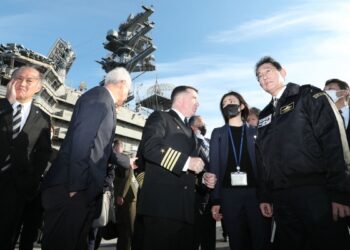 Japan PM pledges to boost military capacity