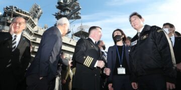 Japan PM pledges to boost military capacity