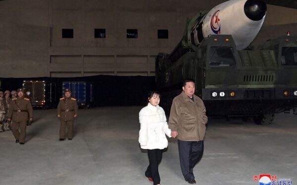 North Korean leader reveals daughter at missile launch