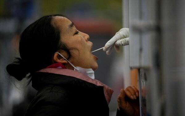 China COVID cases steady as many Beijing businesses, schools shut