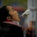 China COVID cases steady as many Beijing businesses, schools shut