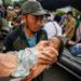 Hunt for buried survivors after Indonesia quake kills 252