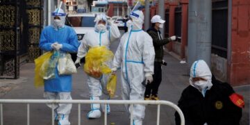 China's COVID infections hit record as economic outlook darkens