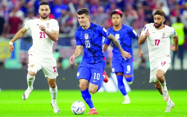 Pulisic sinks Iran as US advance in World Cup duel