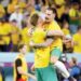 Australia reach World Cup last 16 and send Denmark home