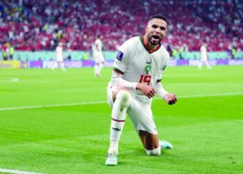 Morocco roar past Canada into last 16