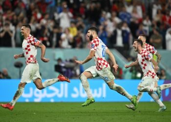 Croatia reach quarters with shoot-out victory