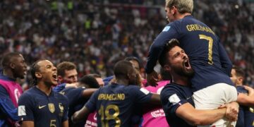 France edges England to move into semis